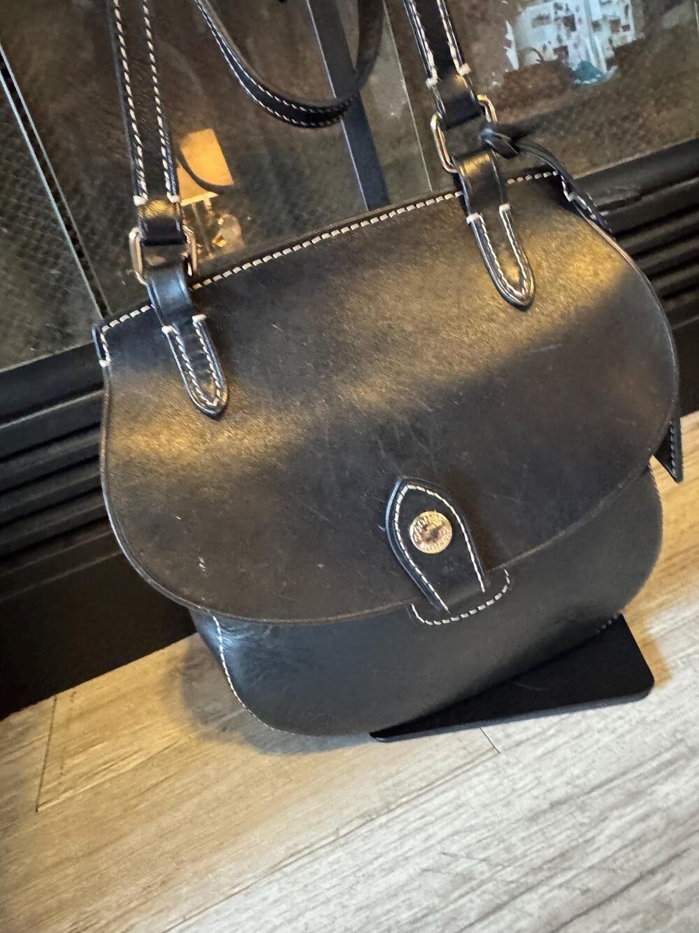 Black Dooney and Bourke Alto made in Italy Saddle Flap Crossbody purse handbag